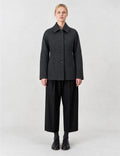 A-line coat with a soft voluminous cut and a concealed button fastening
