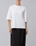 Cropped cupro tennis shirt with dropped shoulders