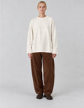 Щільний лонгслів вільної посадки в молочному