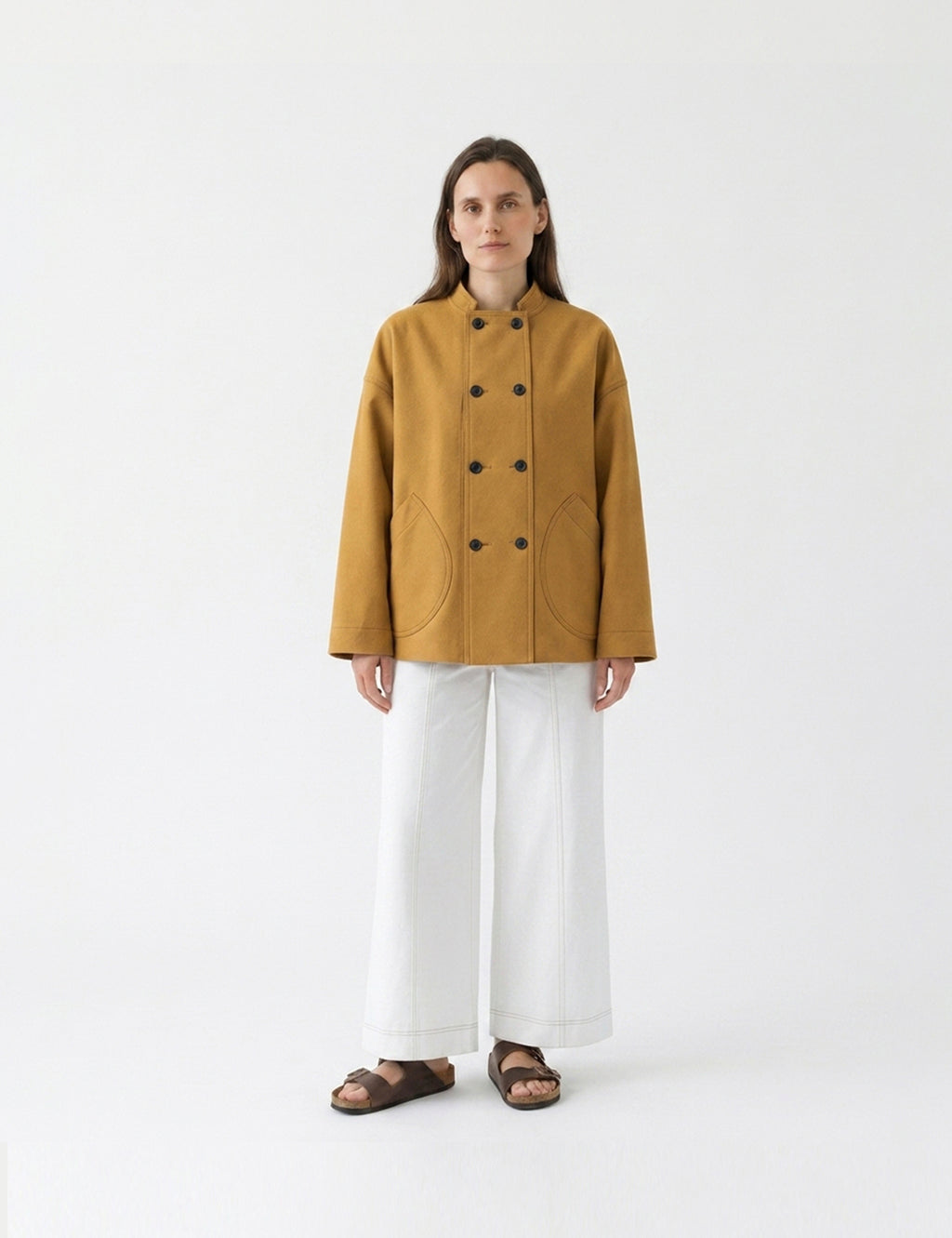 Double-breasted fitted coat with accentuated shoulders in black