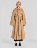 A-line coat with a soft voluminous cut and a concealed button fastening
