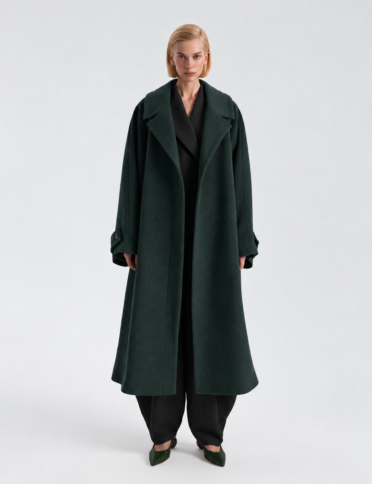 A-line coat with a soft voluminous cut and a concealed button fastening