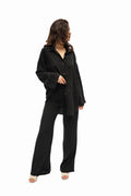 Black loose-fitting linen trousers