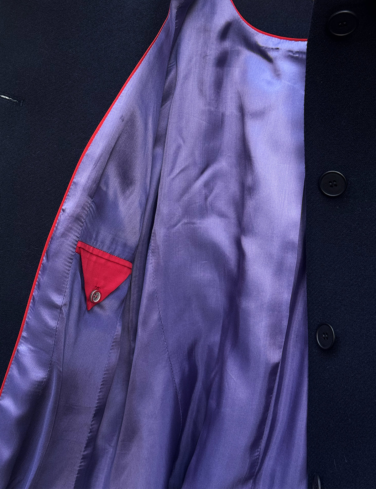 A-line coat with a soft voluminous cut and a concealed button fastening