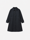 Double-breasted fitted coat with accentuated shoulders in black
