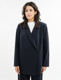 Double-breasted fitted coat with accentuated shoulders in black