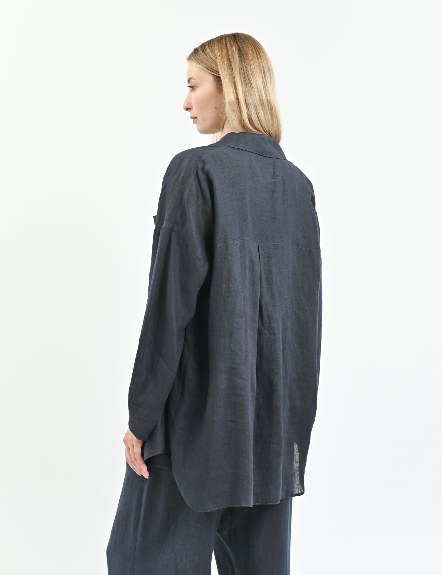 White relaxed-fit linen shirt with dropped shoulders