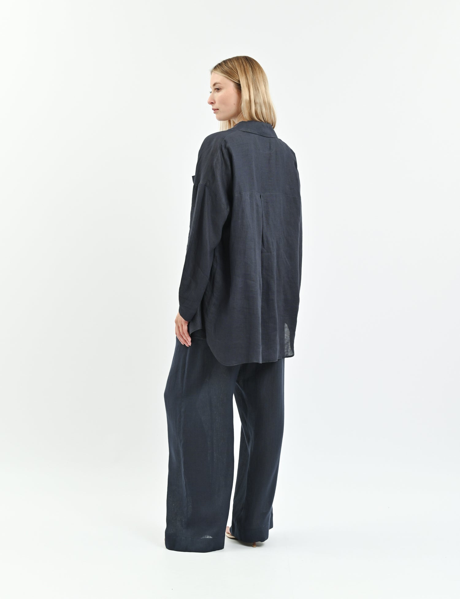 White relaxed-fit linen shirt with dropped shoulders