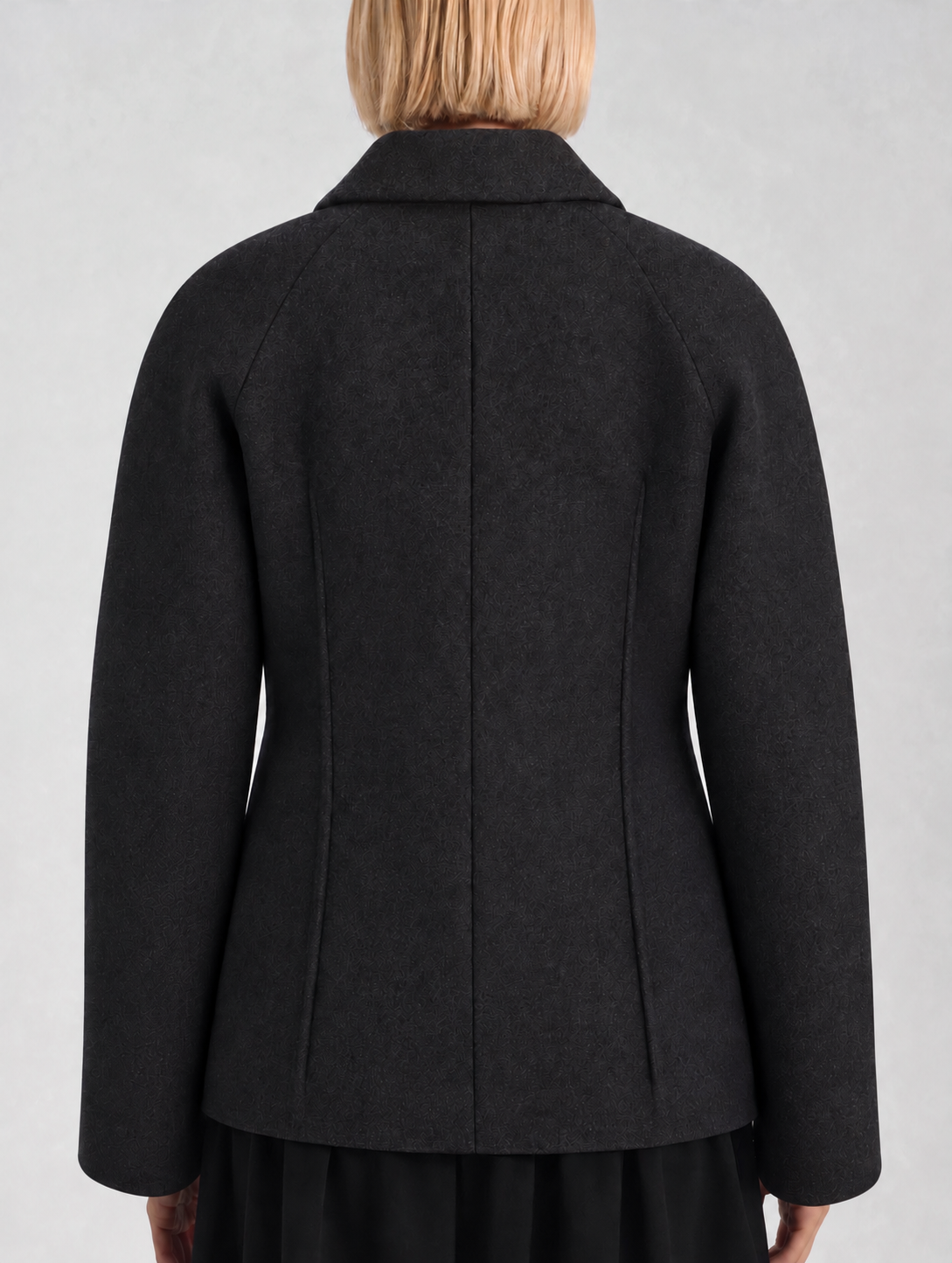 A-line coat with a soft voluminous cut and a concealed button fastening