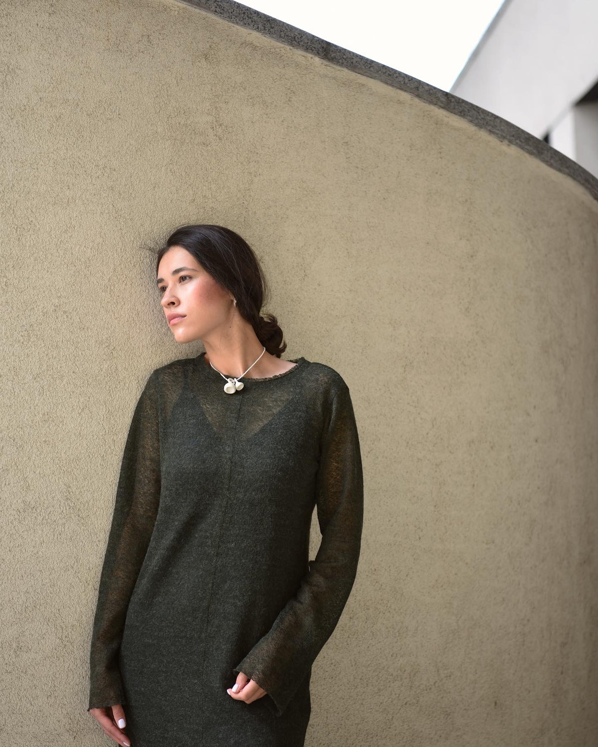 Sheer wool long-sleeve top with extra-long sleeves in green