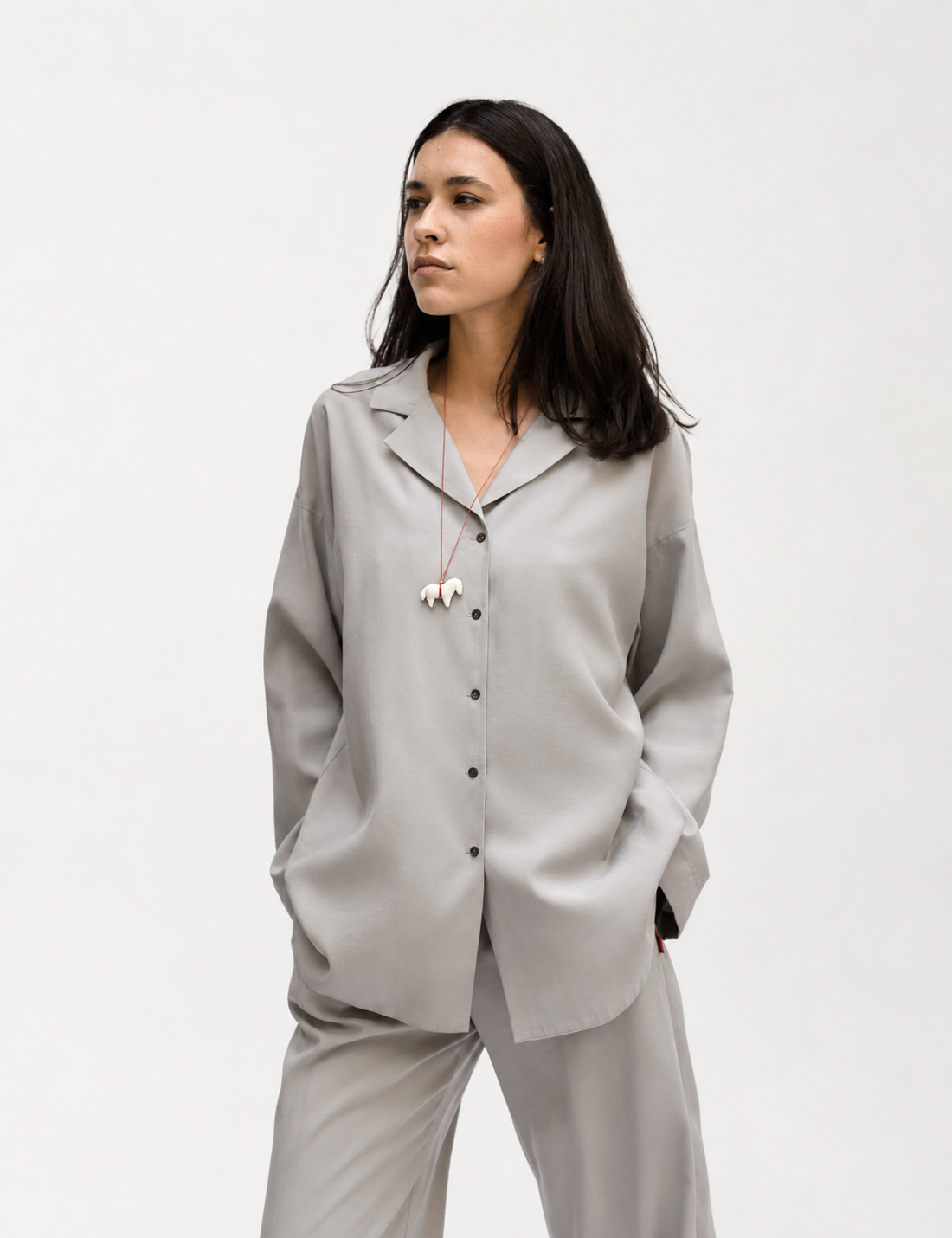 White relaxed-fit linen shirt with dropped shoulders