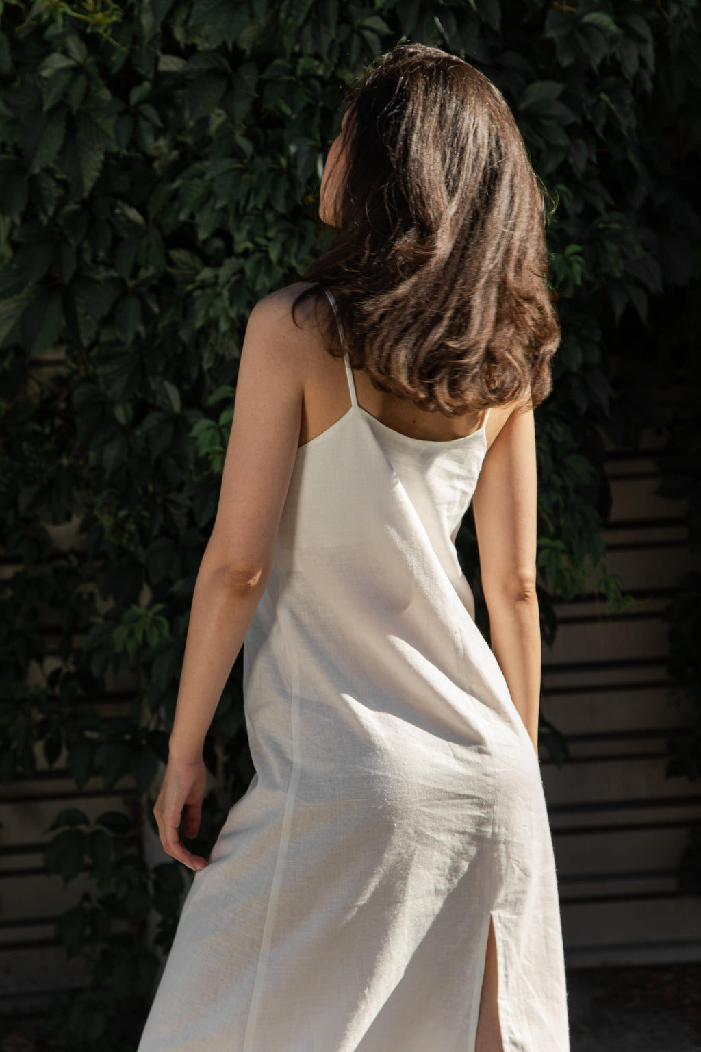 Minimalist black cupro slip dress