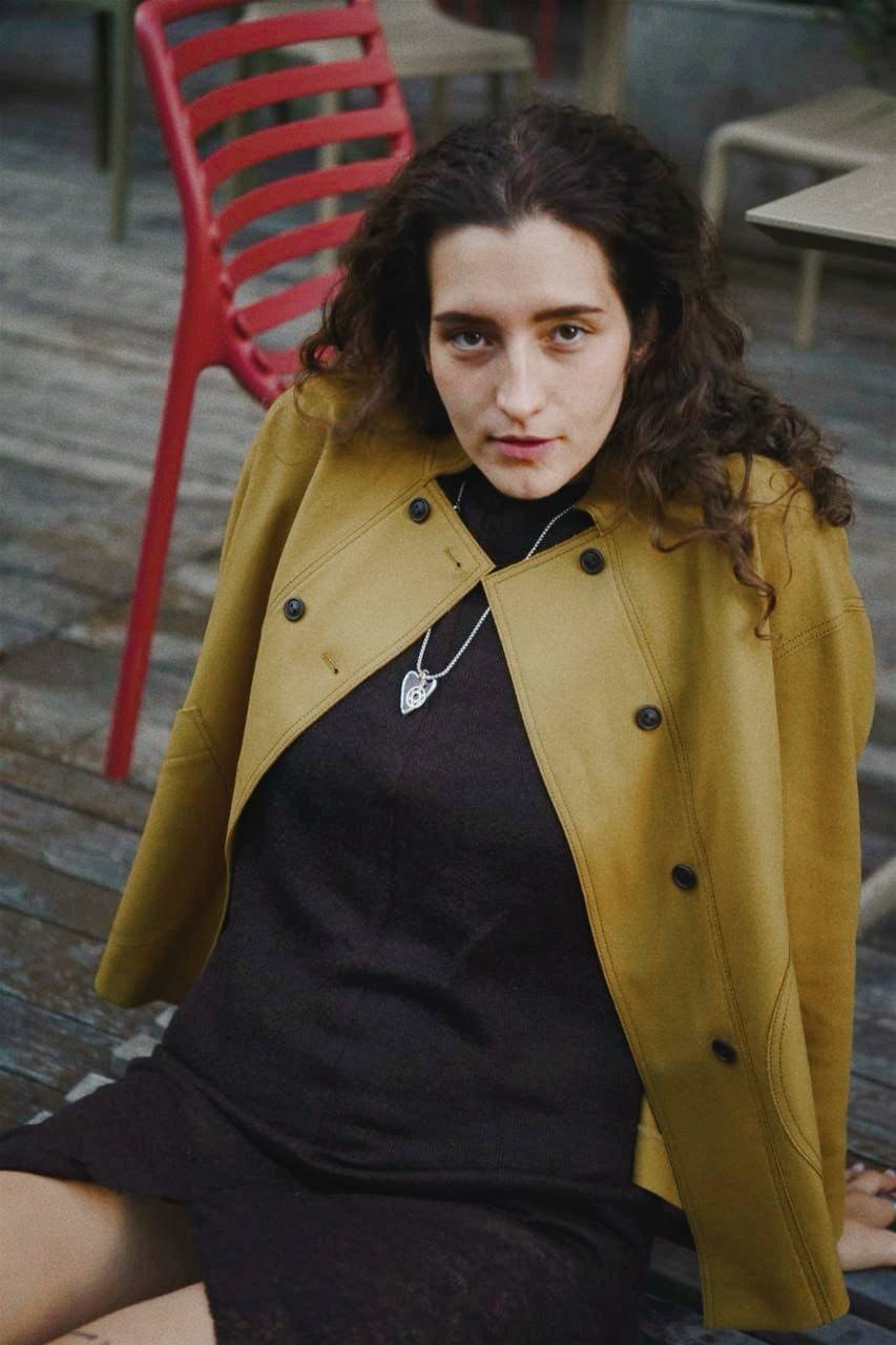 Double-breasted fitted coat with accentuated shoulders in black